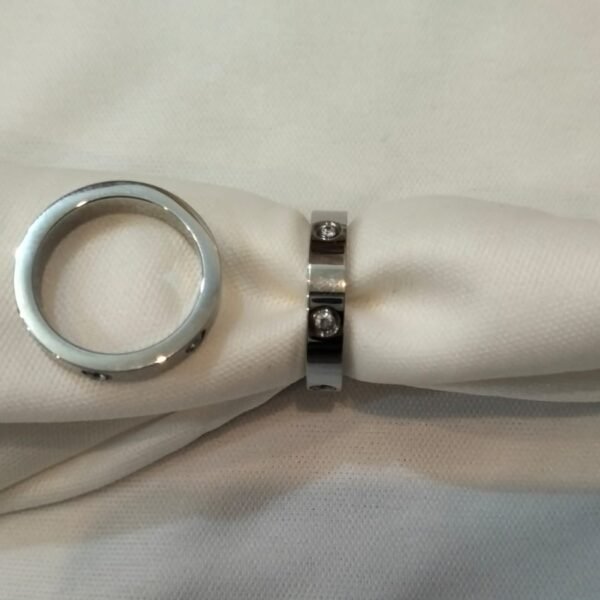 band ring with embedded stones